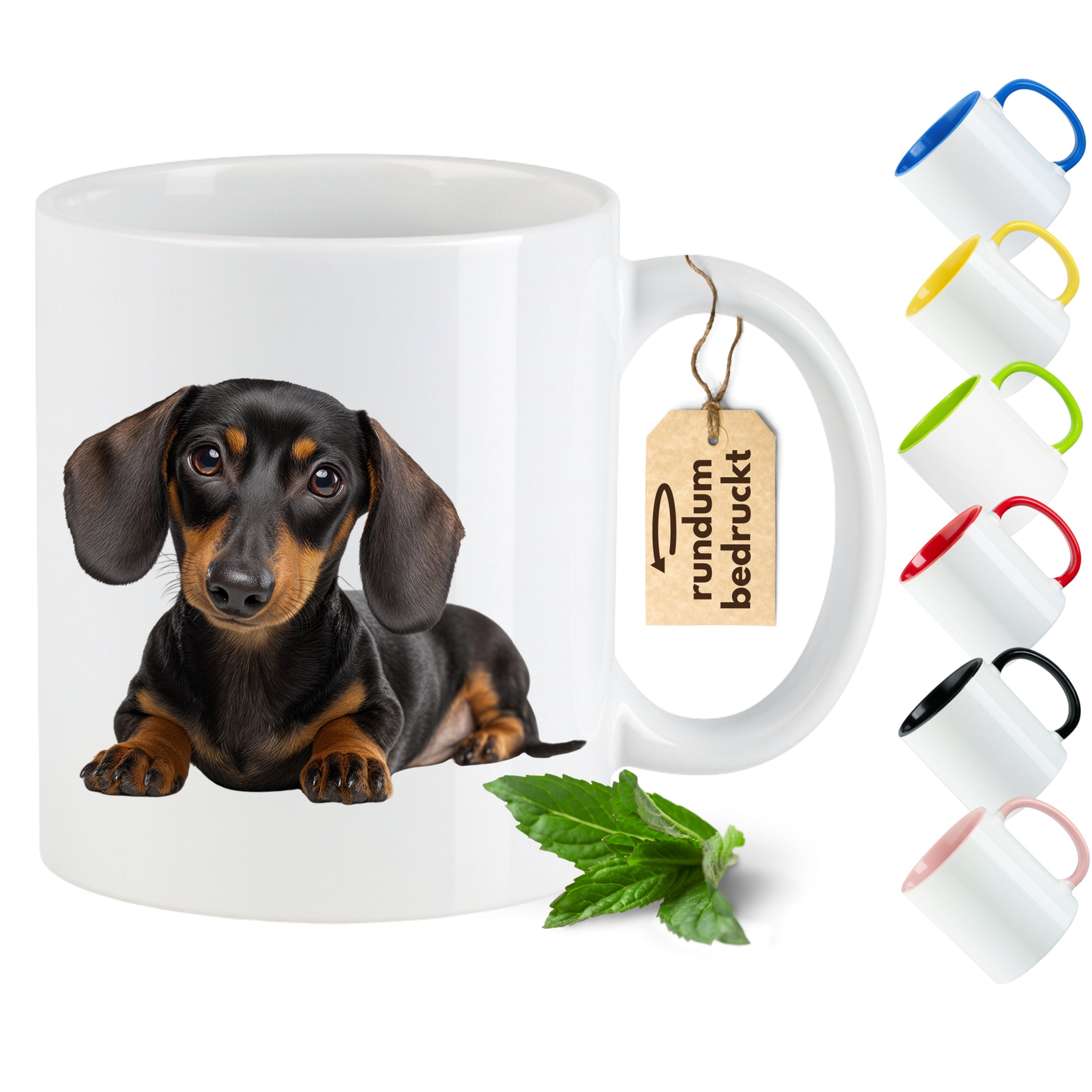 Tasse mit Dackel-Motiv, weiß mit farbigen Griffen.