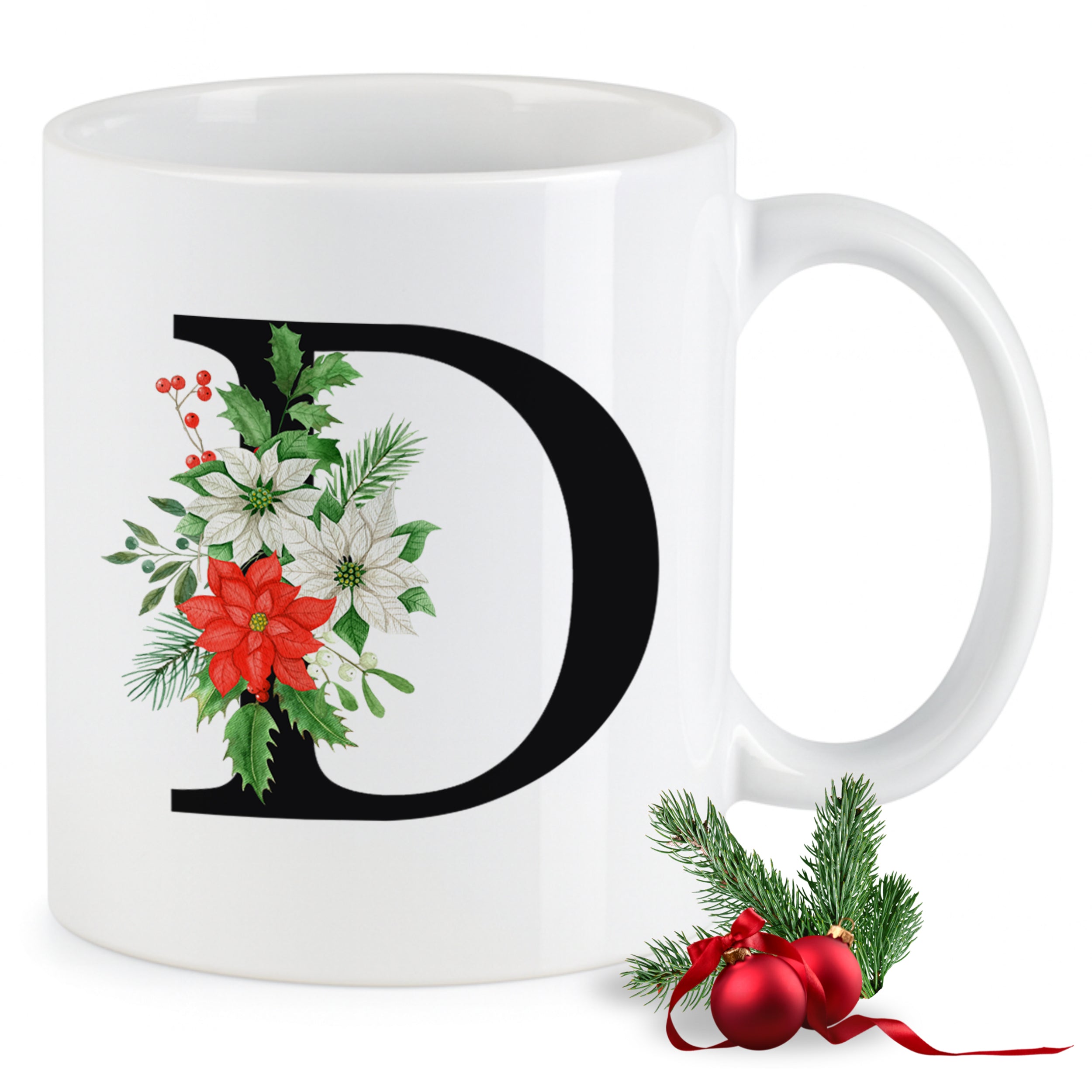 Weißer Kaffeebecher mit floralem Weihnachtsdesign und Buchstabe D.