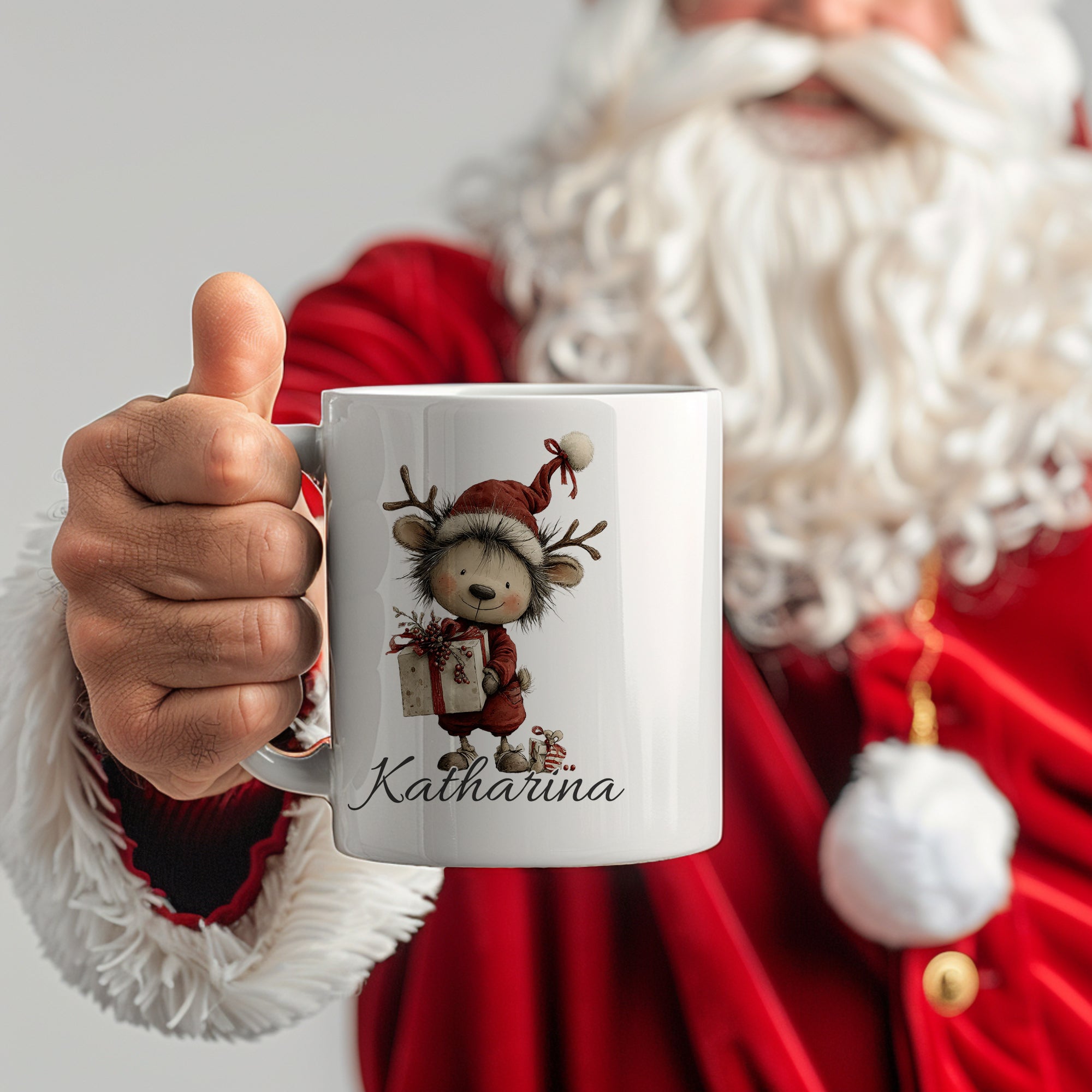 Weißer Becher mit Rentier-Motiv und Name "Katharina".
