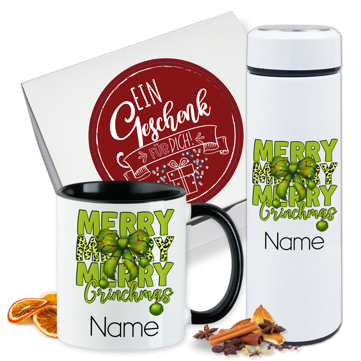 Tasse und Thermobecher mit Weihnachtsmotiv, grün und schwarz.