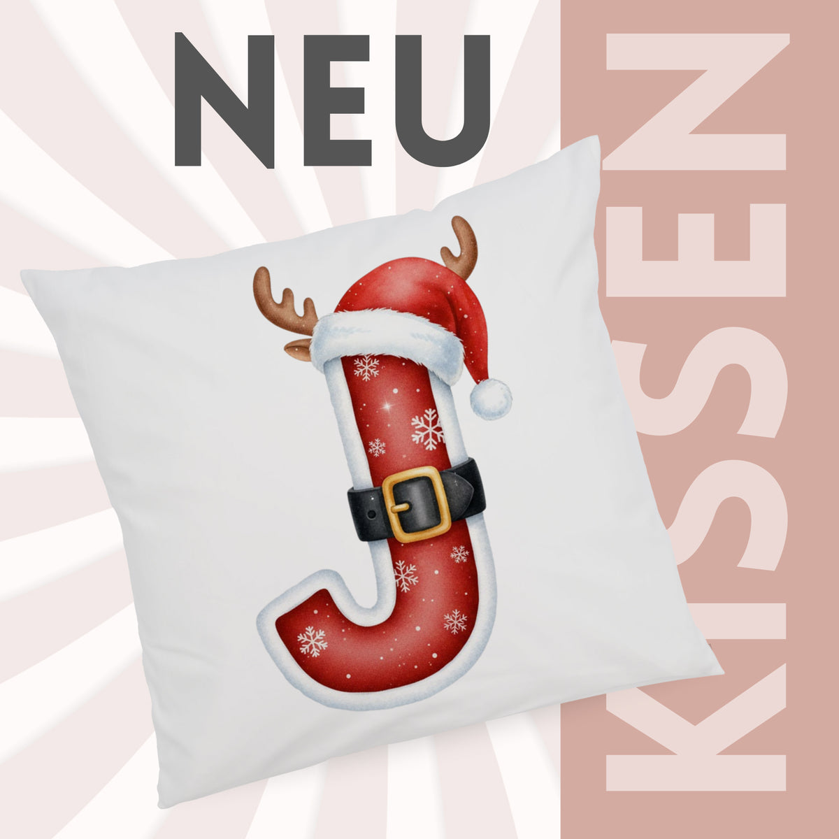 Kissen mit rotem Weihnachtsbuchstaben J und Schneeflocken.