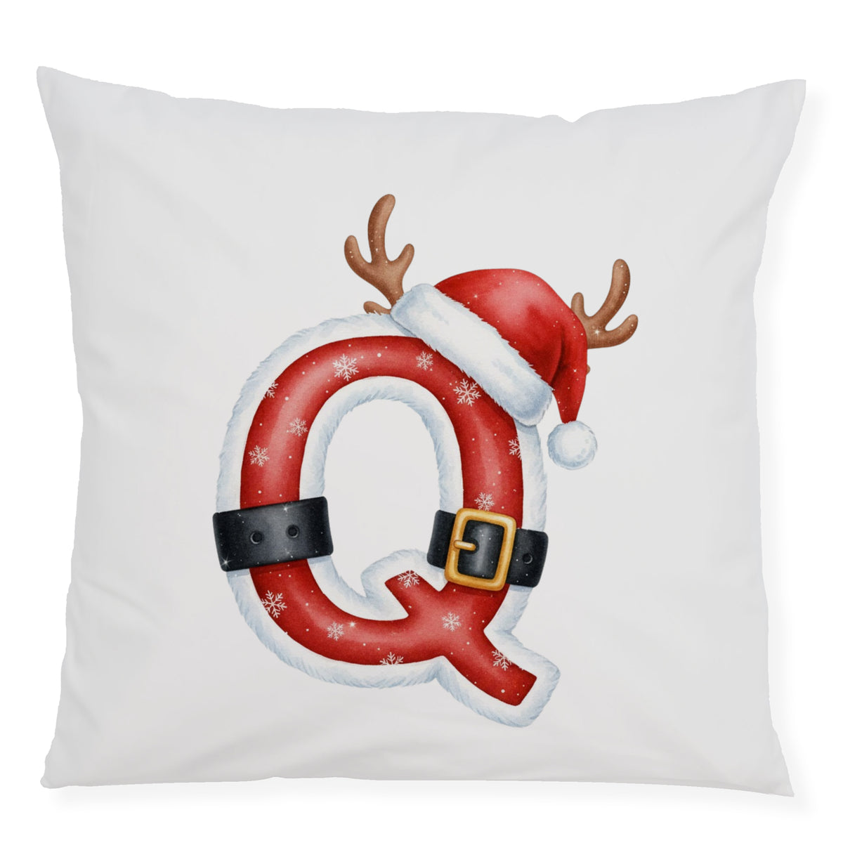 Weihnachtliches Kissen mit rotem Q, Mütze und Geweih.