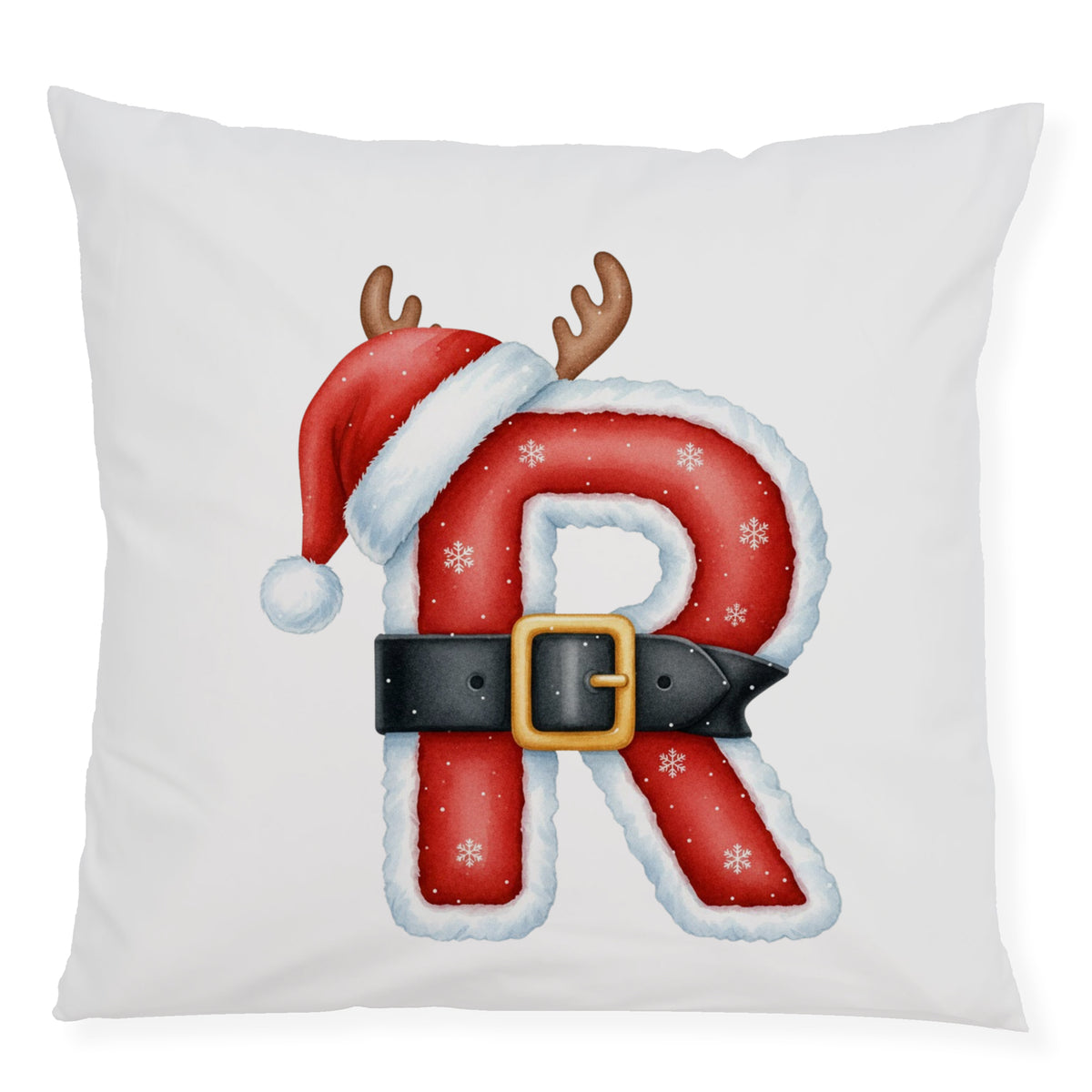 Kissen mit rotem Weihnachtsbuchstaben R, Schneeflocken und Rentiergeweih.