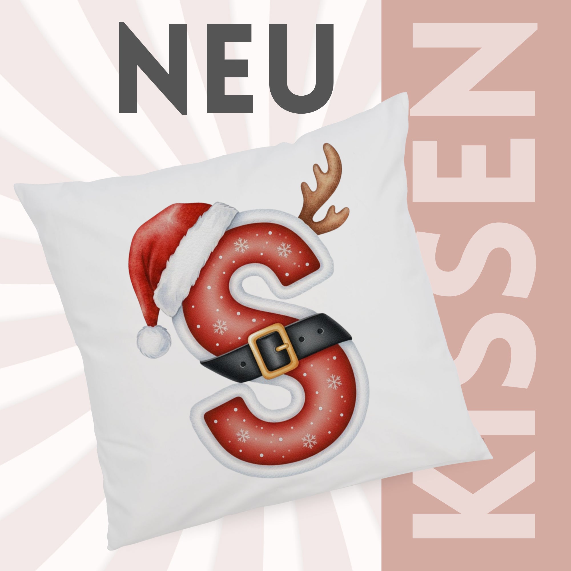 Weißes Kissen mit rotem Weihnachtsbuchstaben S und Dekoration.