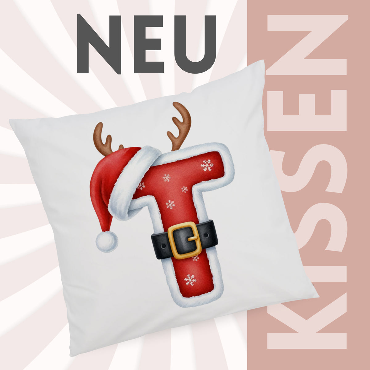 Weißes Kissen mit rotem Weihnachtsbuchstaben T und Rentiergeweih.