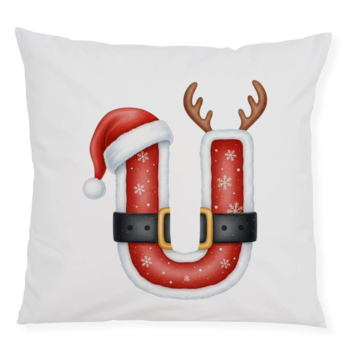Weihnachtliches Kissen mit rotem "U", Mütze und Geweihen.
