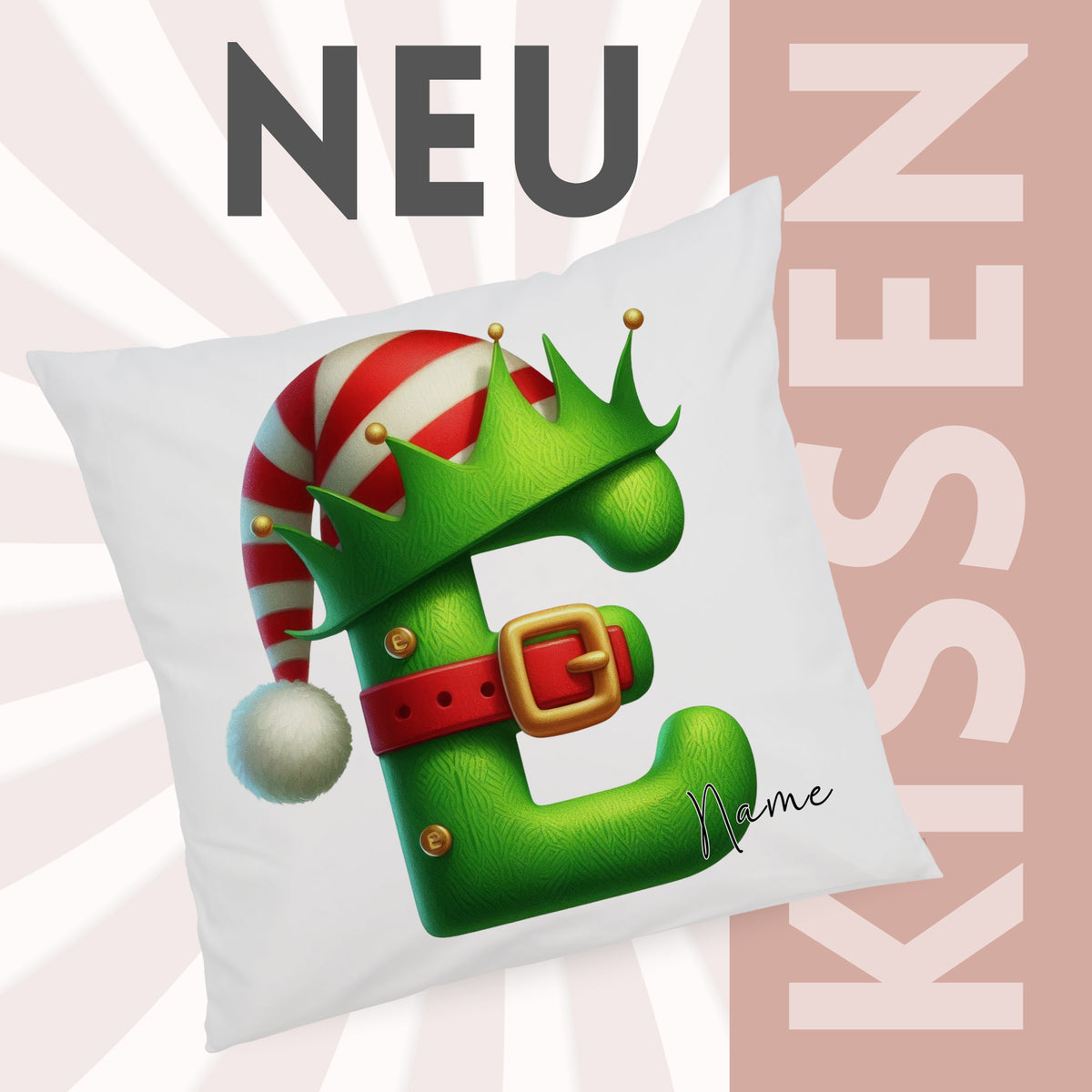 Grünes Kissen mit Weihnachtsmotiv und Buchstabe E.