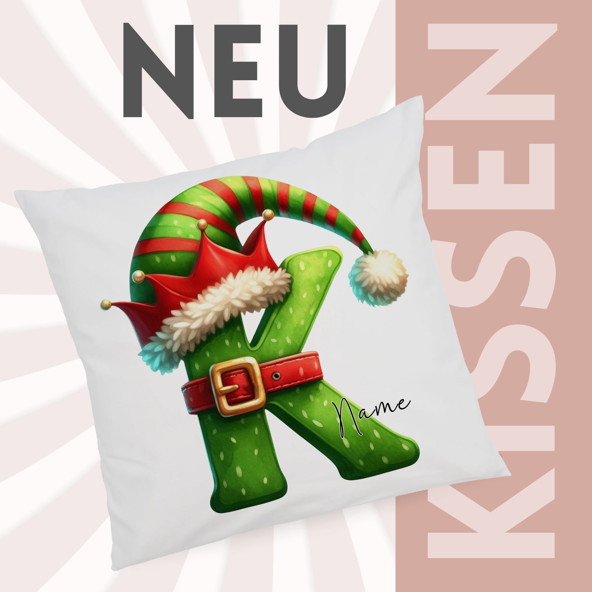 Kissen mit grünem Buchstaben K und Weihnachtsmütze.