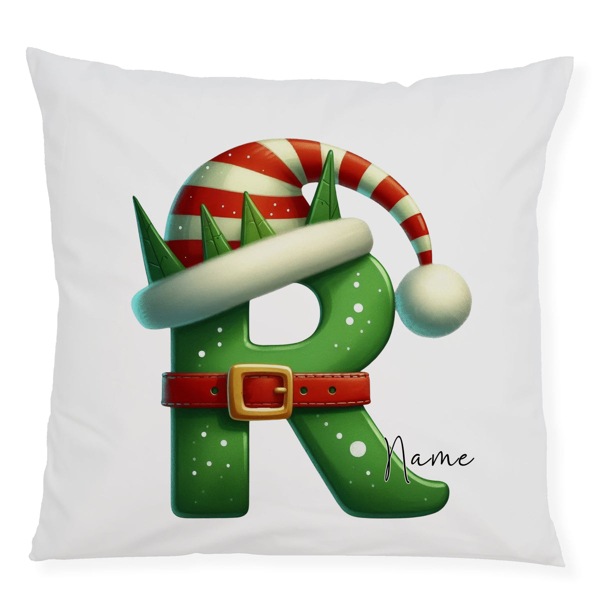 Grüne Weihnachtskissen mit Buchstaben R, Weihnachtsmütze und Gürtel.