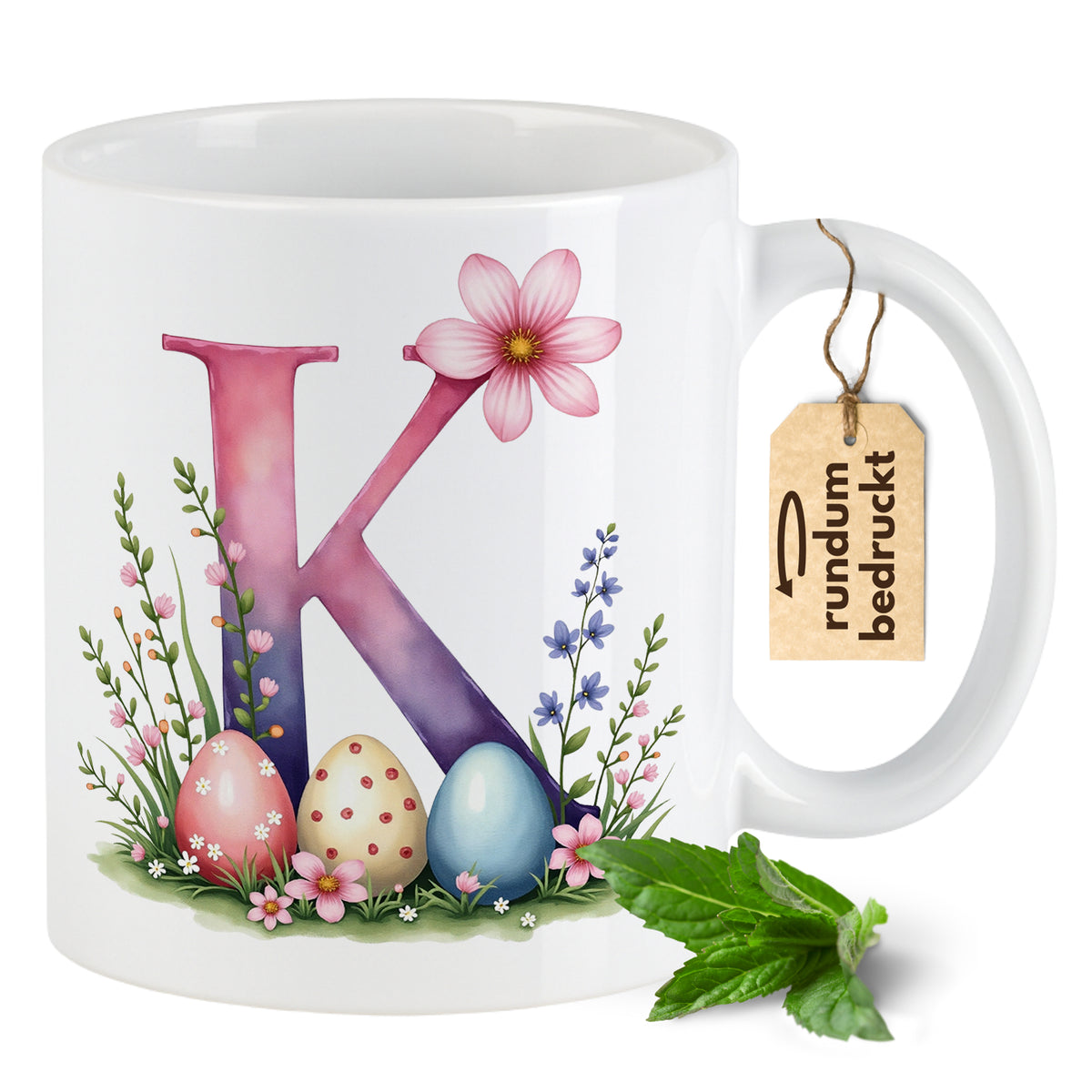 Kaffeetasse mit buntem K, Blumen und Ostereiern.