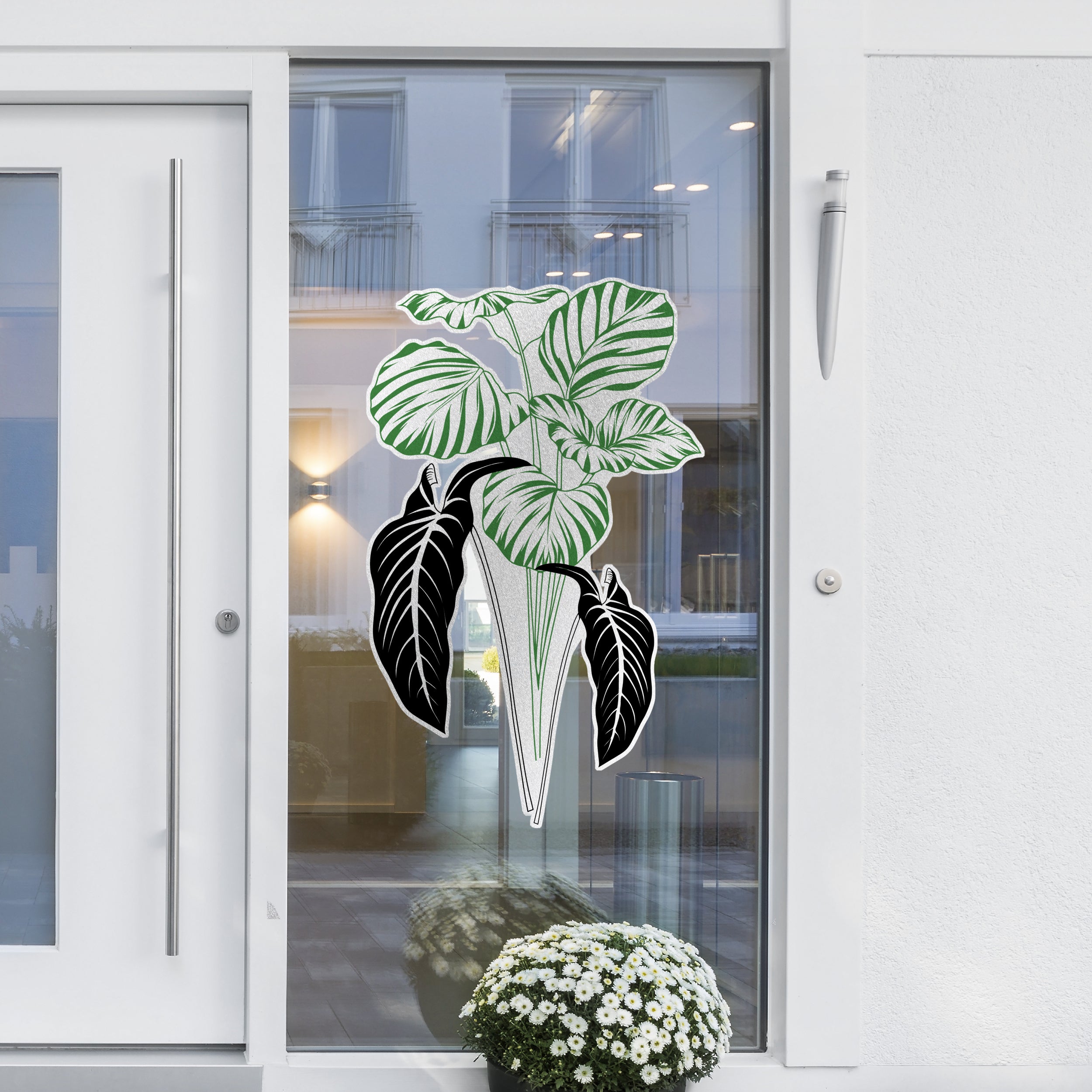 Grüne Pflanzenaufkleber mit schwarzen Blättern für Fensterdekoration.