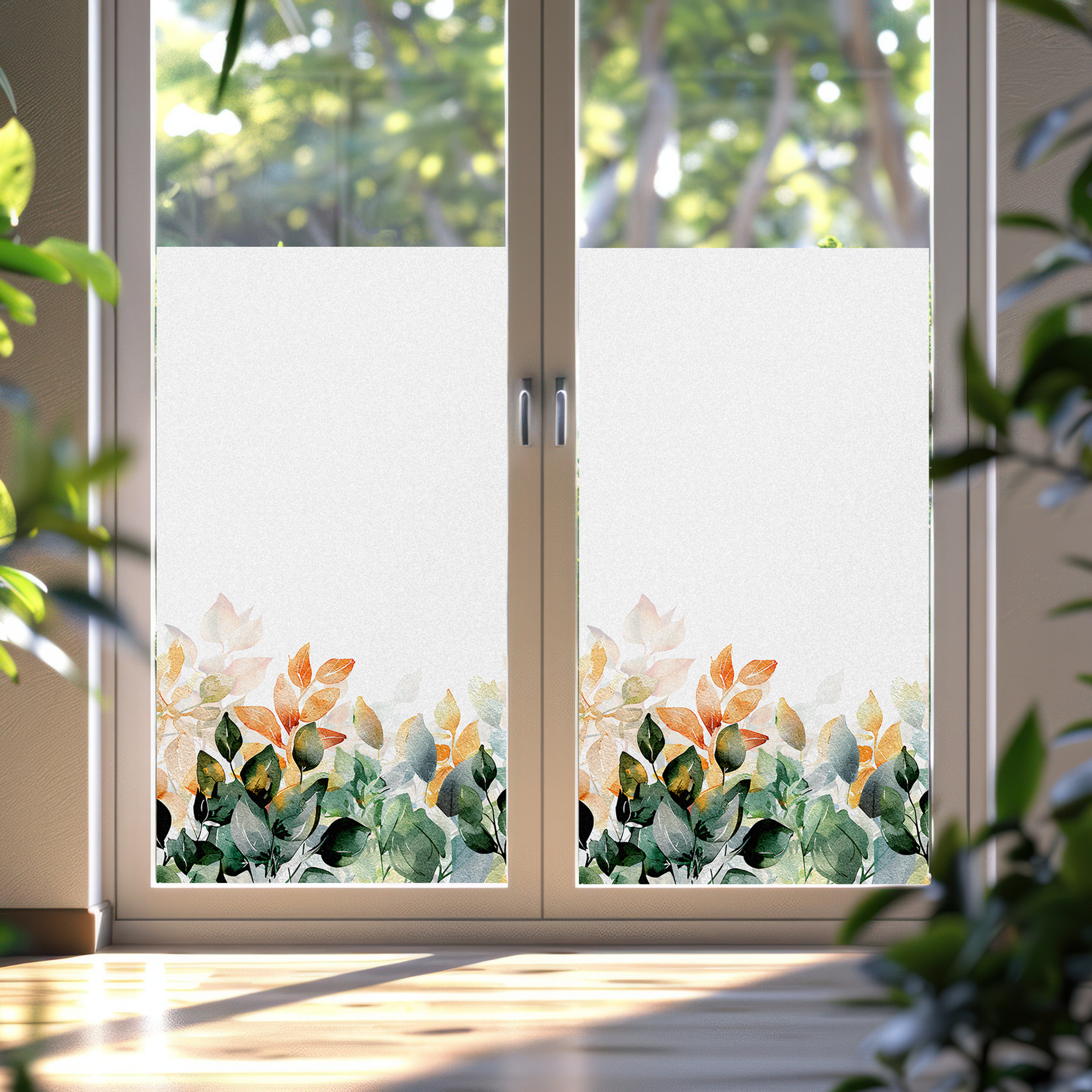 Fensterfolie mit bunten, grünen und orangenen Blättern.