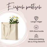Beiger Baumwollbeutel mit langen Trägern und Blumen.