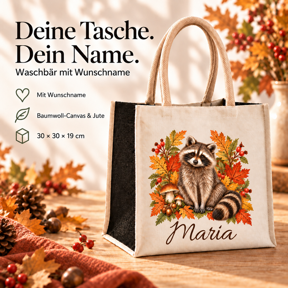 Einkaufstasche mit herbstlichem Waschbär-Motiv und Wunschname mit Angaben zu Material und Maßen.