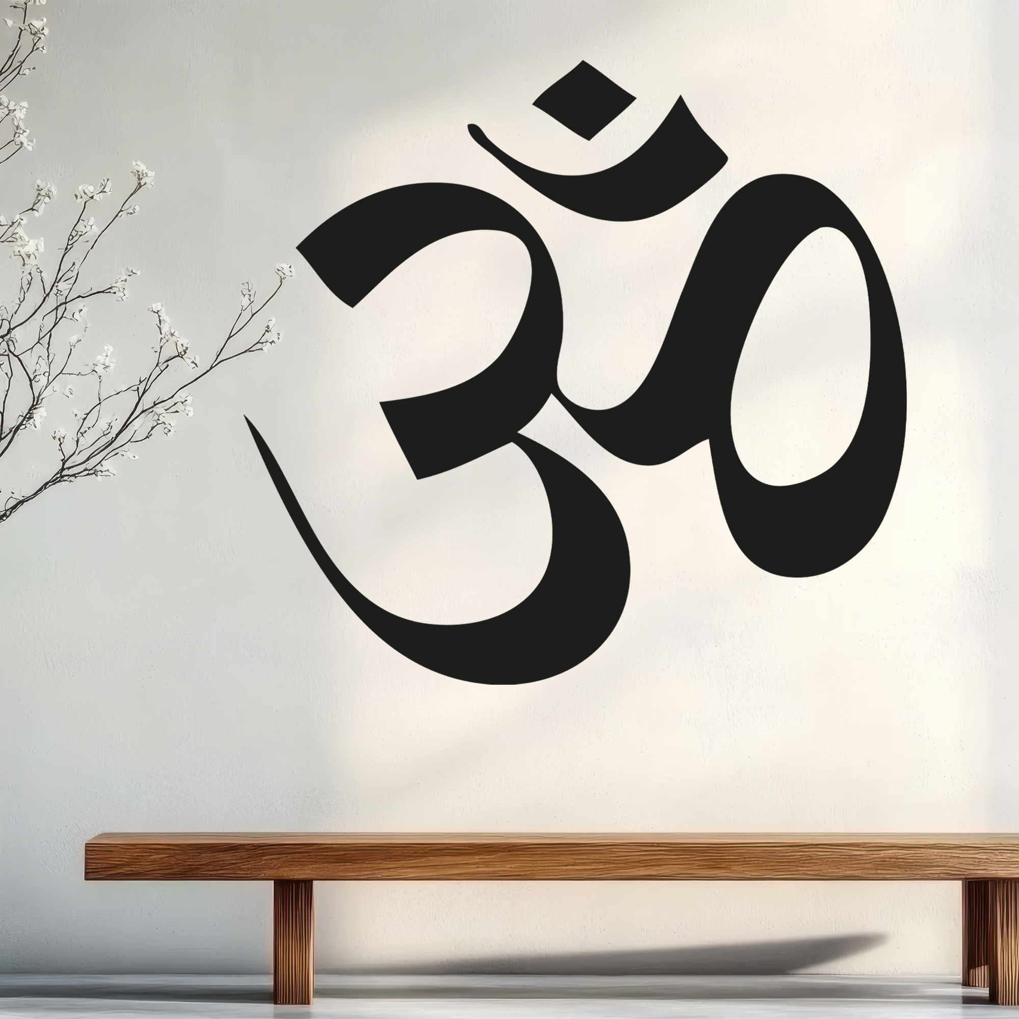Wandtattoo Schwarzes Om-Symbol an weißer Wand mit Holzbank.