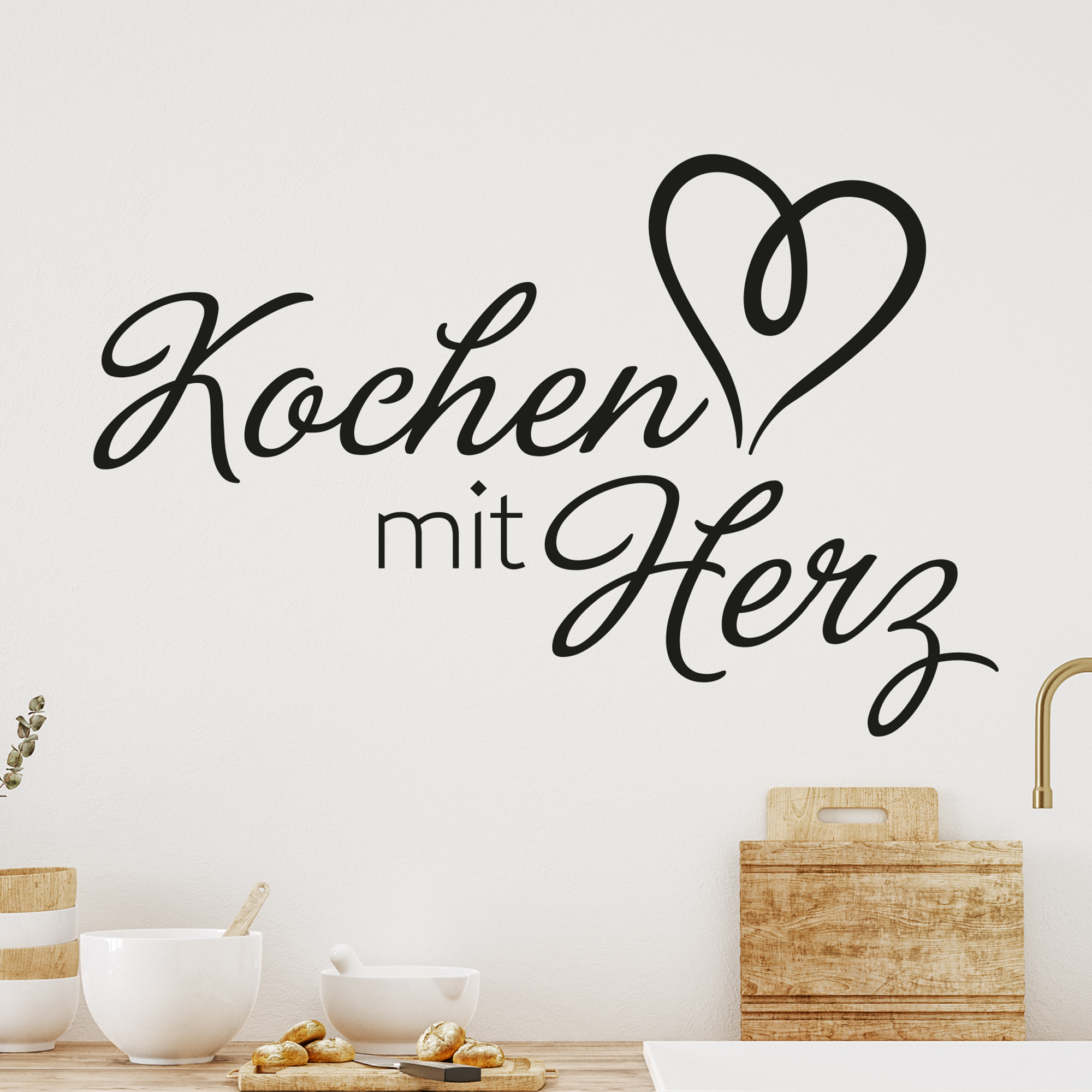 Wandtattoo "Kochen mit Herz" in Schwarz.