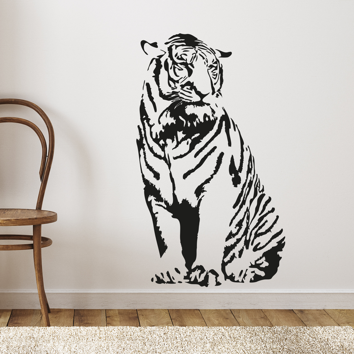 Schwarz-weißer Wandaufkleber eines sitzenden Tigers.